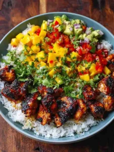 Grilled Maple Sriracha Chicken Bites with Coconut Rice & Mango Avocado Salsa Bowl
